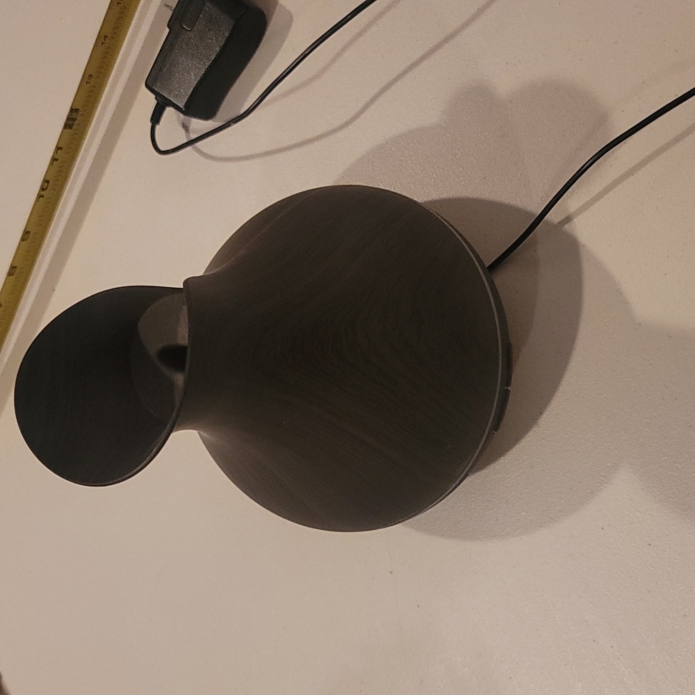Oil diffuser with timer.  Timer option wood look
